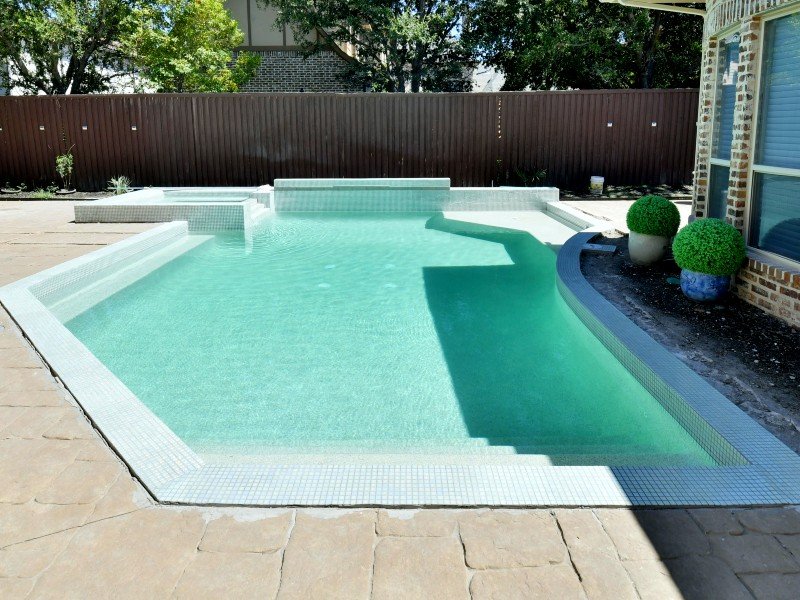 Before concrete pool deck coating project